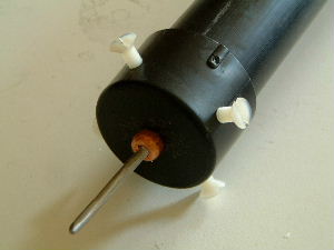 The tip of the high voltage probe.