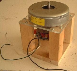 The lightweight wooden support structure for the vacuum cleaner motor.