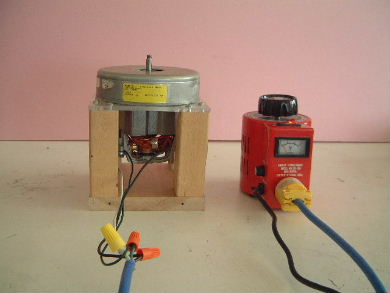 The vacuum cleaner motor connected to the VARIAC for speed control.