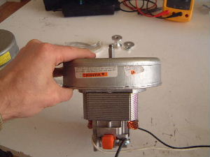 Side view of bare vacuum cleaner motor.