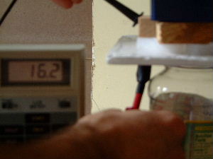 Measuring the capacitance of the barium titanate and wax
      dielectric.