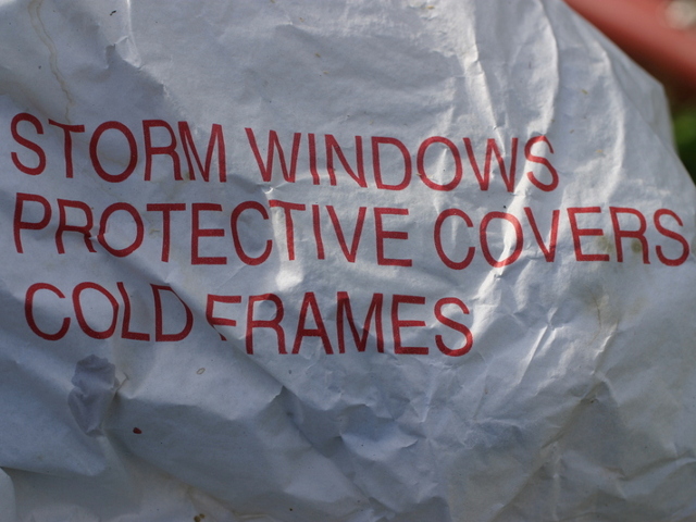 The label for the UV resistant plastic used to repair the shattered solar panel. The label says Storm Windows Protective Cover Cold Frames.