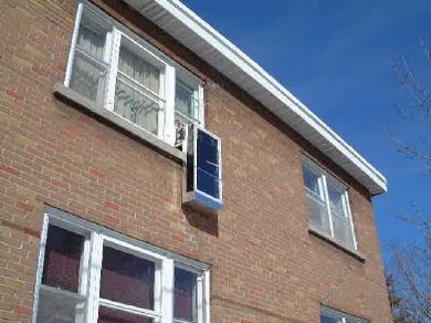 Indoor-to-indoor window solar air heater exterior view.