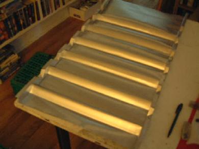 Aluminium flashing back sheet and attached two side sheets for the absorber, still under contruction at the time.