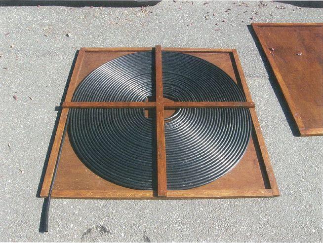 Spiral solar pool heater collector in Tuscany.