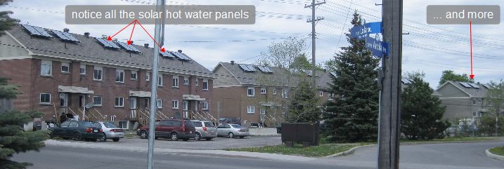 Set of 48 townhouses each with 2 solar collectors heating water for them, giving a total of 96 collectors.