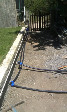 Pipework for the DIY solar pool heating system ready to be buried.