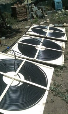 One view of the DIY solar pool heater panels in place.
