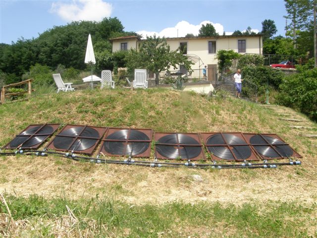 Six flat spiral solar heat collectors.