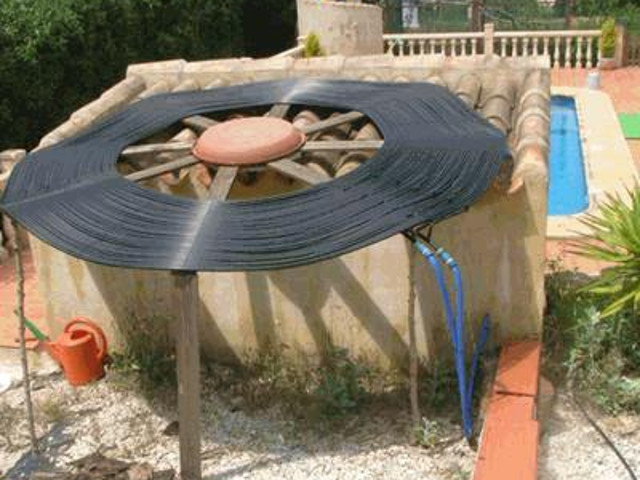 Flat spiral solar heat collector.