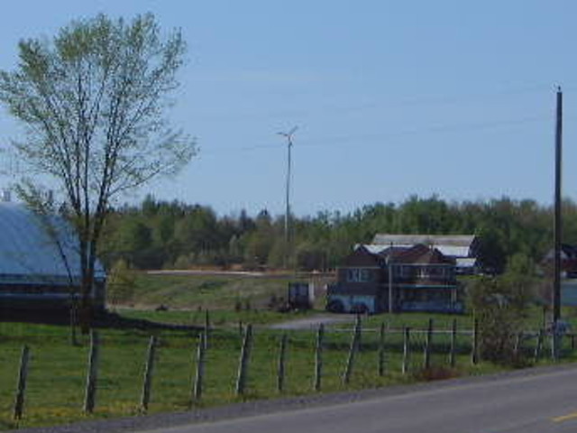 View of the wind turbine from far away.