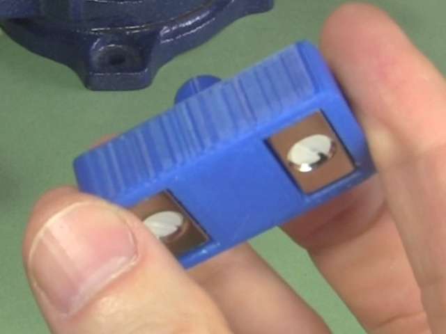 View of the magnetic holder showing the magnets underneath.