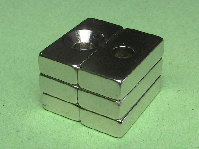 20mmx10mmx4mm (or 5mm) neodymium magnets.