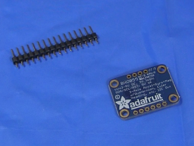 The male pin header and the BNO055 board from Adafruit.