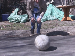 Rolling BB-8's fiberglass ball on ashfalt to test for roundness.