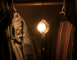 Electric fly swatter powering a CFL lighting a closet.