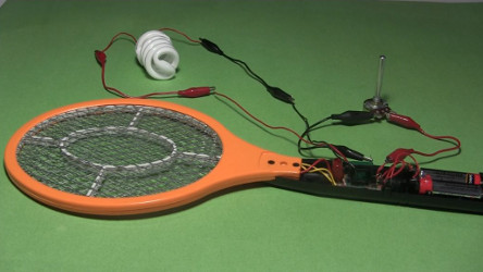 Electric fly swatter powering a CFL taken apart for testing
      which resistance gives the best light.