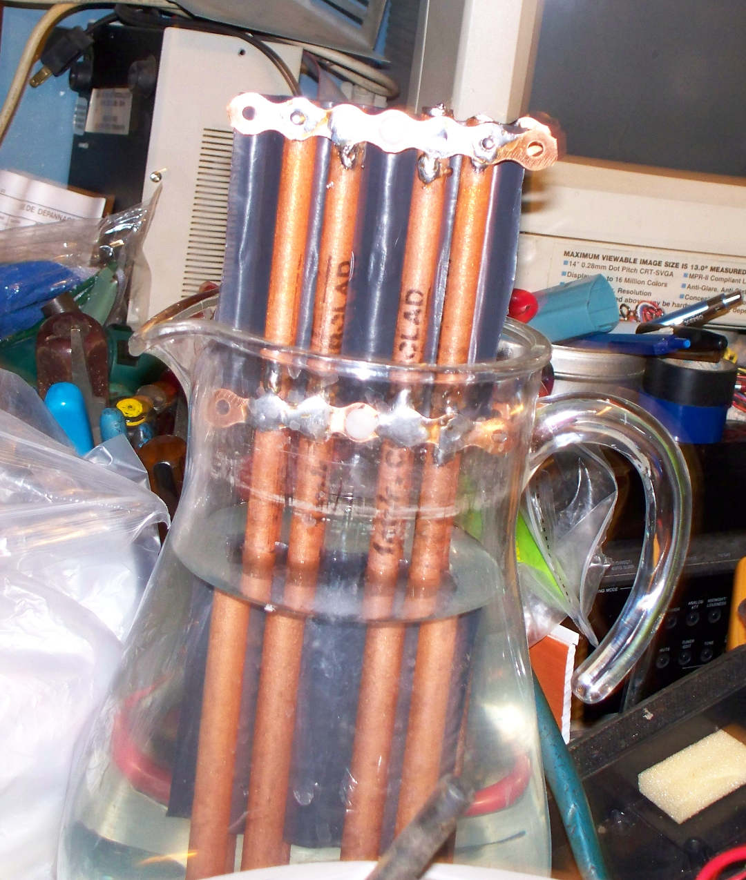 1/8 rod electrolyzer with corrugated plastic between the + and - elements and using nylon bolts to hold everything together.