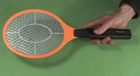 An electric fly swatter/zapper racket.
