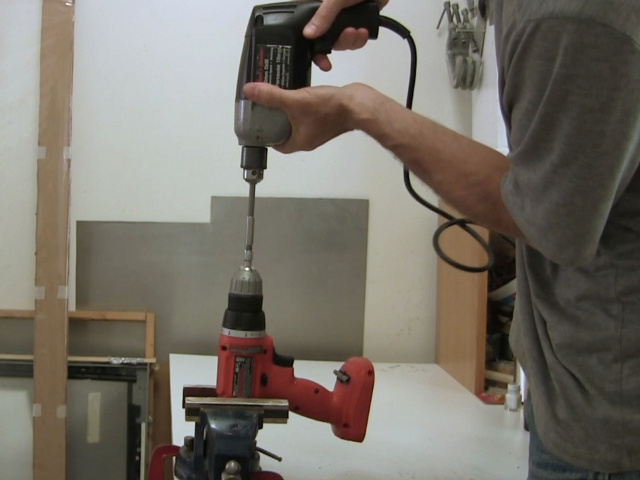 Drilling with a second drill to loosen the chuck.