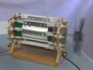 A DIY corona motor turning a fan blade at high speed.
