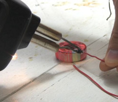 Soldering wire with thicker insulation on the ends of the first joule thief coil.