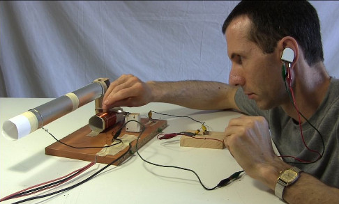 Blued razor blade diode with pencil being used with a crystal radio.