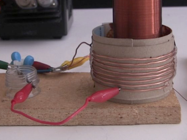 Bare wire helical primary coil for Tesla coil.