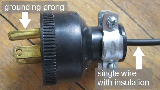 DIY plug with just the grounding prong connected.
