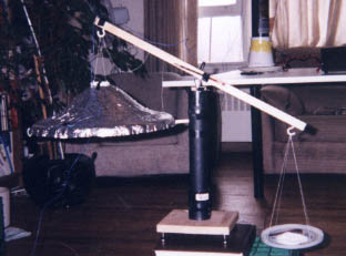 T.T. Brown Bahnson labs test diagram with saucer suspended
      using a balance.