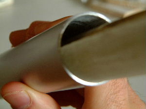 View of the epoxy part for the electric field thruster
      capacitor showing the fit with the aluminium cylinder.