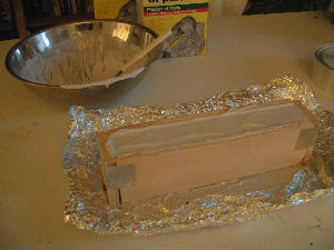 The plaster poured into the mold.