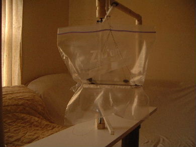 Plastic bag test for Poynting flow thruster with bare wire 
      left alone.