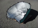 Car sunshade solar cooker.