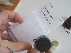 Piezo buzzer bought from Radio Shack and the packaging it came in.