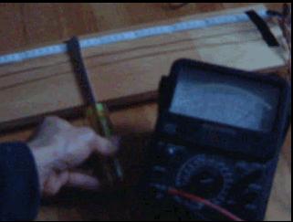 Video showing an UHF oscillator being tested
        using a lecher line and an analog volt meter.