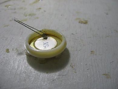 Diode soldered to piezoelectric disk.