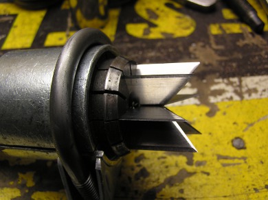Close-up of the utility blades in the punch.