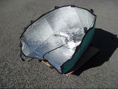 Car sunshade solar cooker highly optimized.