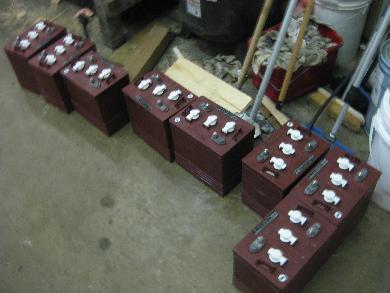 The 8 Trojan batteries before installing.
