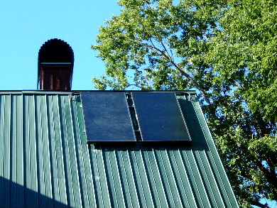 Steeply mounted flat plate collectors on a steep roof.