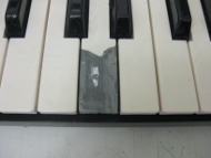 J-B weld piano/keyboard key.