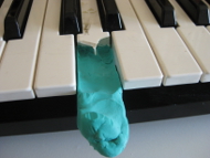 Plasticene started for the mold to repair the piano/keyboard key.