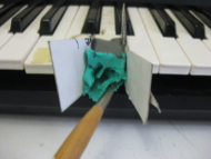 Removing plasticene mold for the piano/keyboard key.
