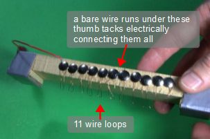 The 11 wire loops making up the playing head for the 555 timer musical instrument.