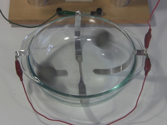 Closeup of the ball cyclotron/electrostatic accelerator running.