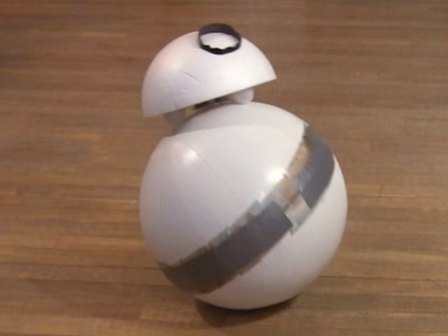 BB-8 (v2) with its head tilted back showing head rollers and magnets.