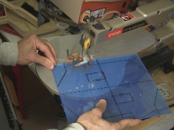 Cutting the plate for the BB-8 drive system.