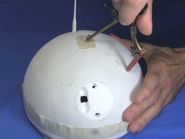 Marking where to paint on BB-8's head.