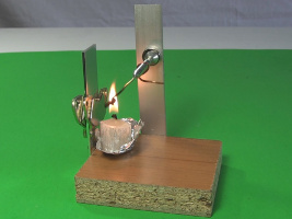 Demagnetized nickel in the flame in the Curie temperature experiment.